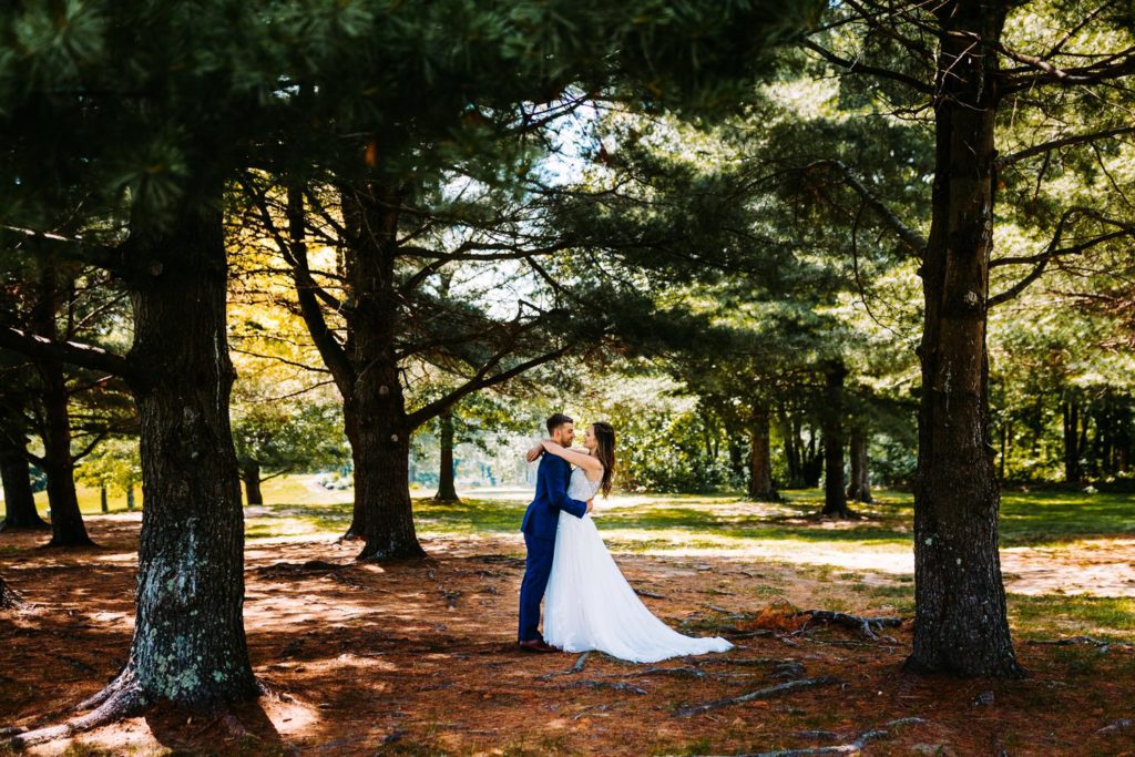 Wide panoramic shot of Chippanee Country Club grounds in Bristol Connecticut on a summer wedding day