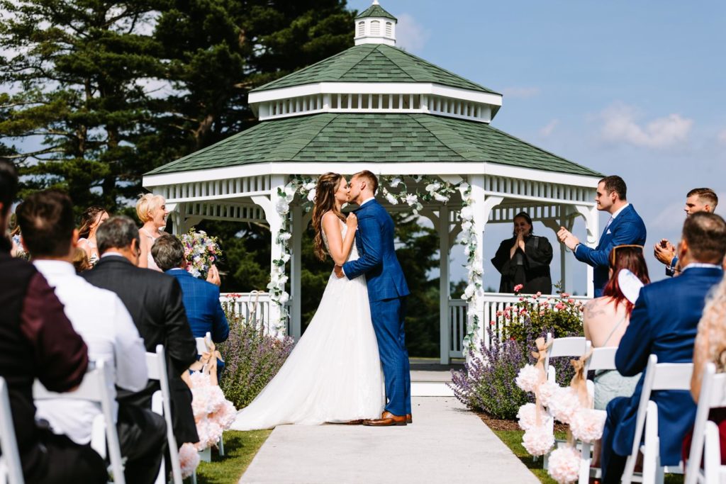 First kiss as newlyweds at Chippanee Country Club gazebo ceremony in Bristol Connecticut