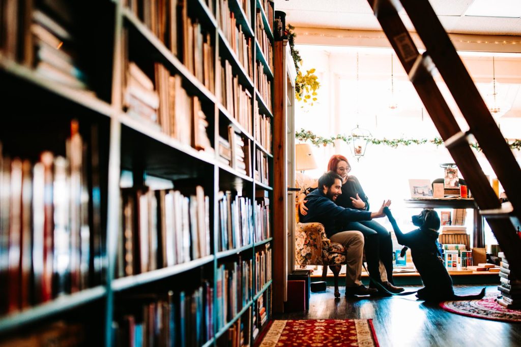 Photo of a couple at Rarities Books and Bindery in Rhode Island with their dog