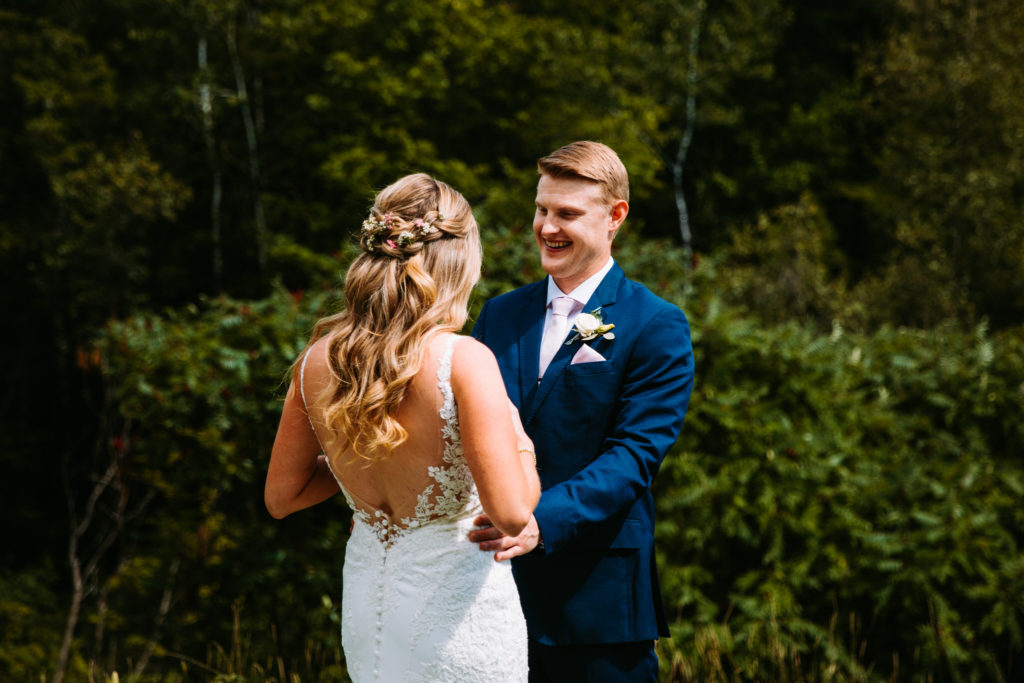 First look between a bride and groom on their wedding day in Massachusetts
