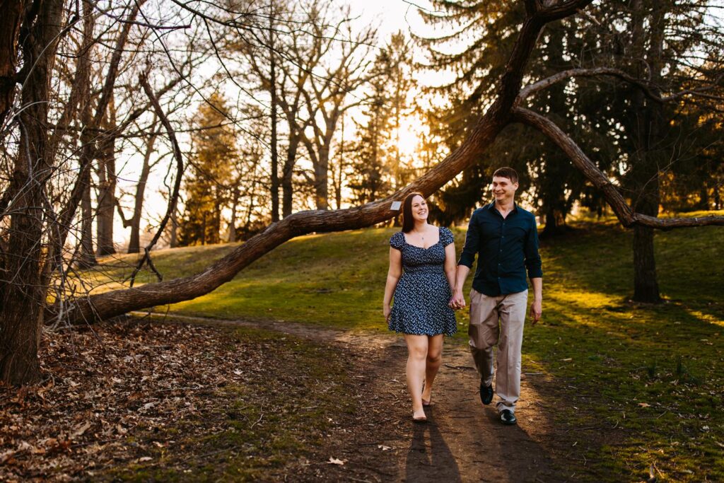 couple walking on a trail at Roger Williams Park in Providence, Rhode Island
