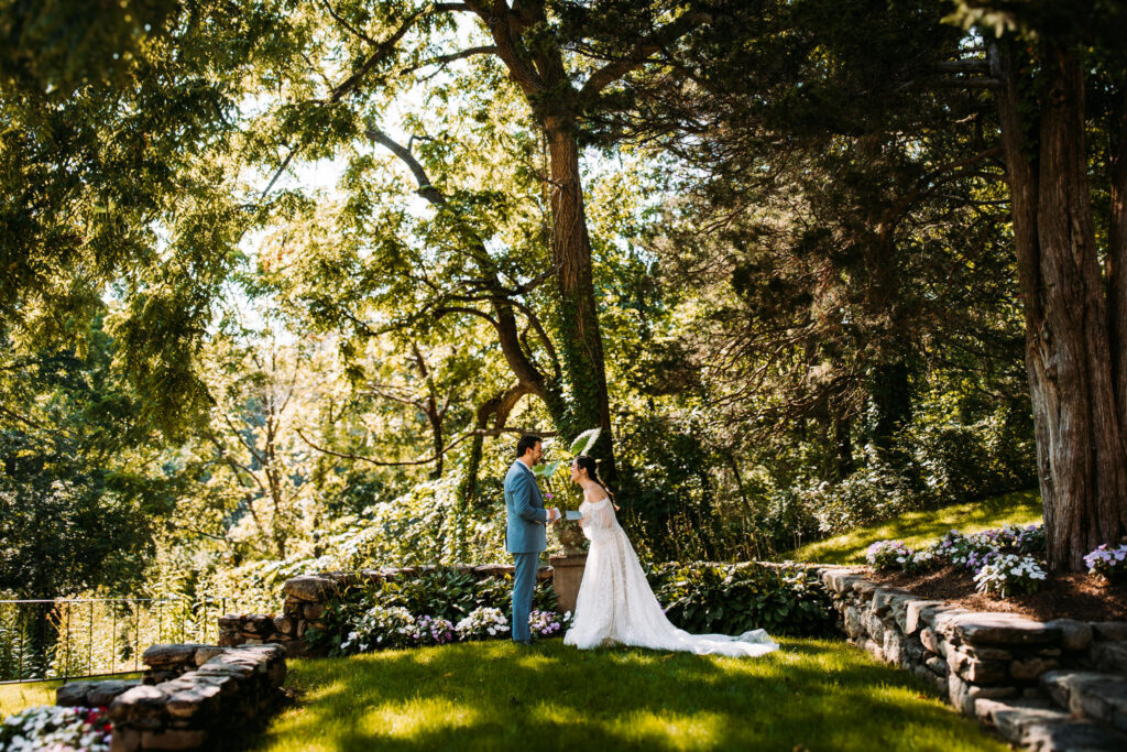 A couple shares private vows at their wedding at The Connors Center in Dover, Massachusetts
