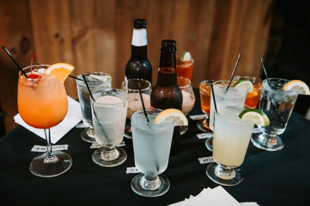 Table full of signature drinks and cocktails ready for guests at the reception