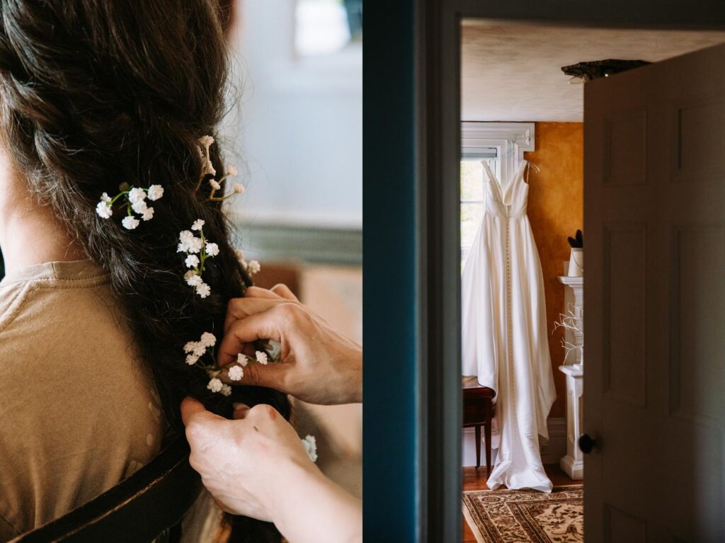 Close-up of bridesmaid styling bride’s hair with baby’s breath flowers.