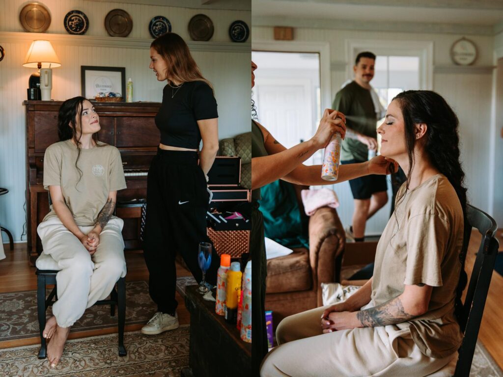 Bride smiling during makeup prep, surrounded by friends and snacks