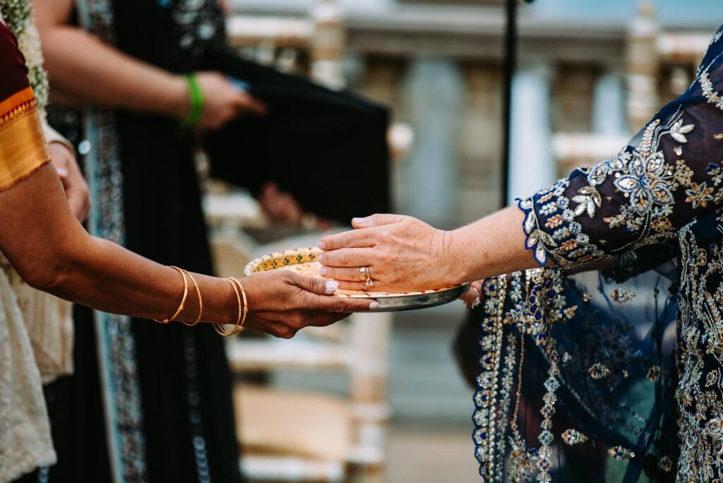 Close-up of symbolic ritual during Indian wedding ceremony at Grandview Mendon Massachusetts