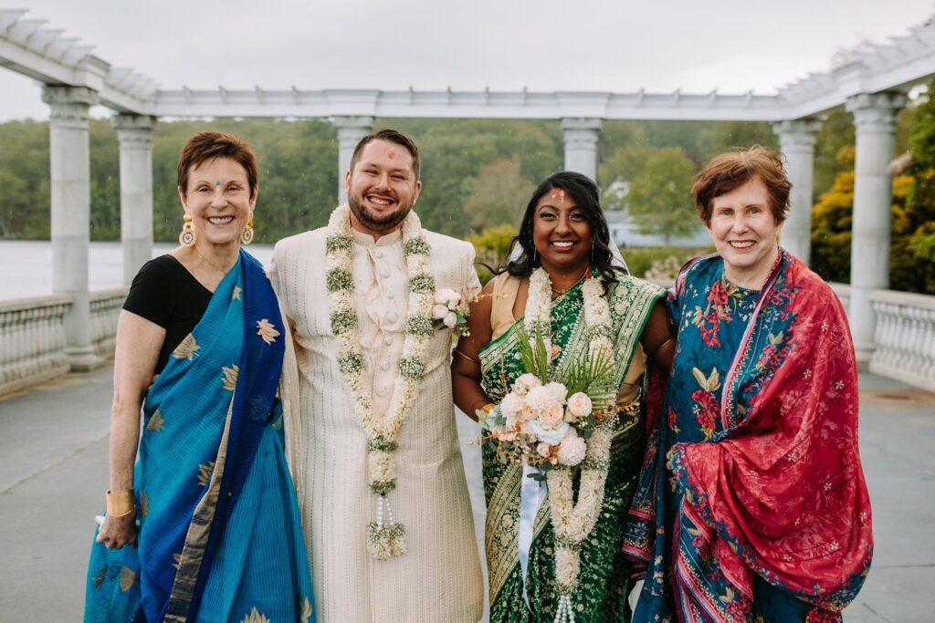 Classic family formal portrait outdoors after Indian wedding ceremony at Grandview Mendon Massachusetts.