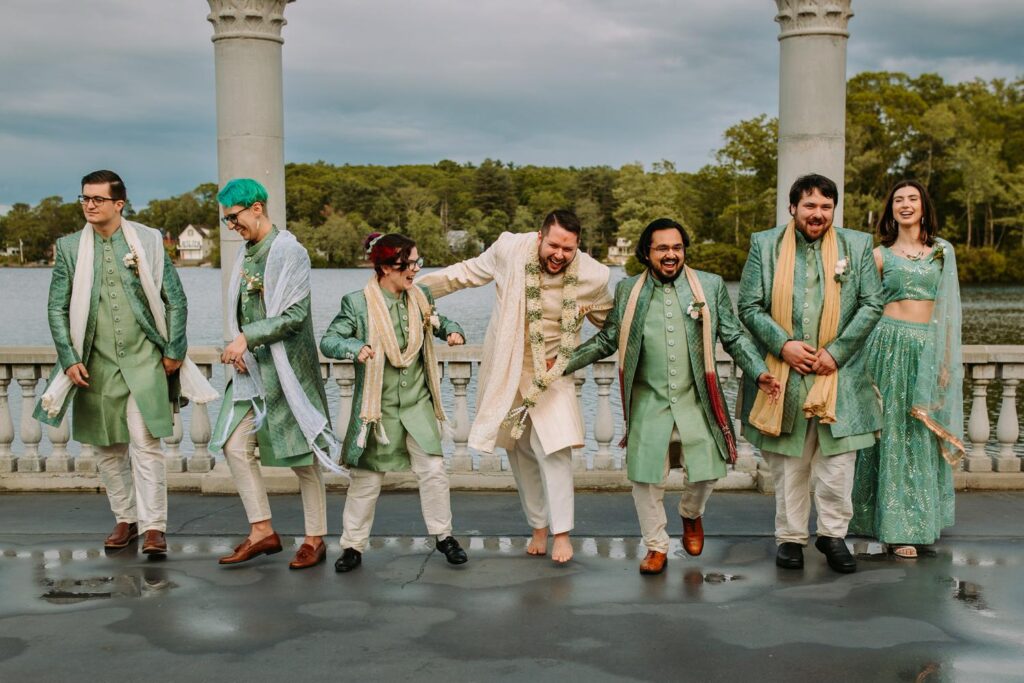 Groomsmen outdoors posing playfully at Grandview Mendon Massachusetts Indian wedding celebration