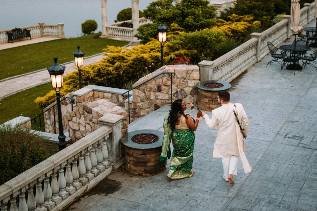 Bride and groom outdoors at Grandview Mendon Massachusetts with water view during Indian wedding portraits