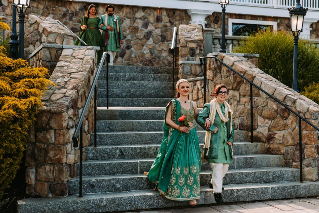 Wedding party processional entering outdoor ceremony space at Grandview Mendon Massachusetts Indian wedding