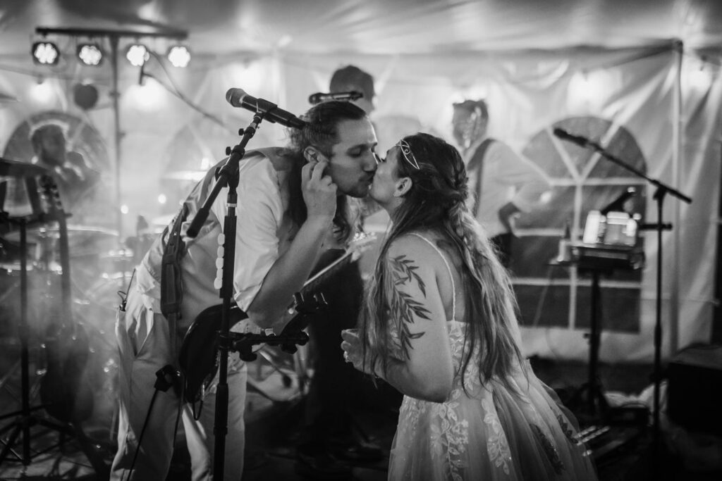 A bride and groom play live music at their backyard wedding in Moodus, Connecticut