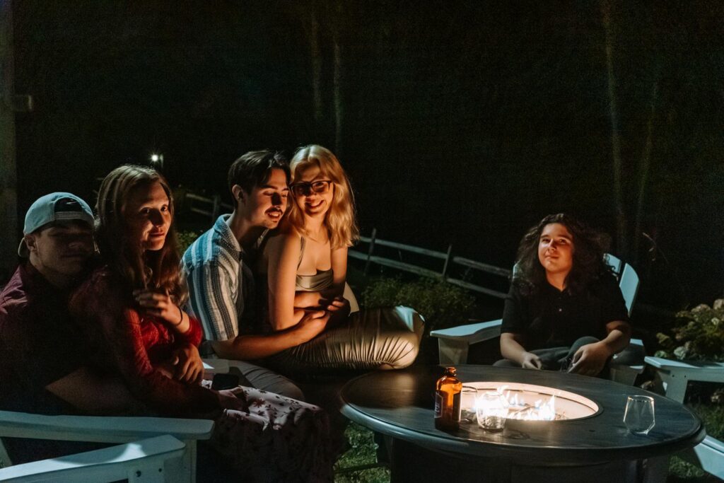Adirondack chairs around firepit at The Barn on Gobeille Farm wedding in Sharon Vermont