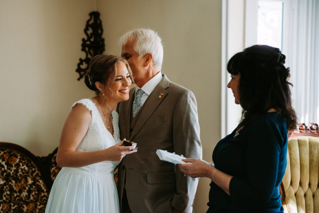 A bride's parents react to their wedding gifts at Maple Rock Farm