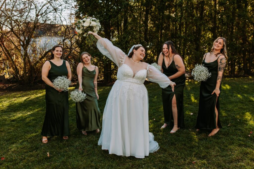 Marlee and bridesmaids laughing together at The Publick House wedding in Sturbridge Massachusetts