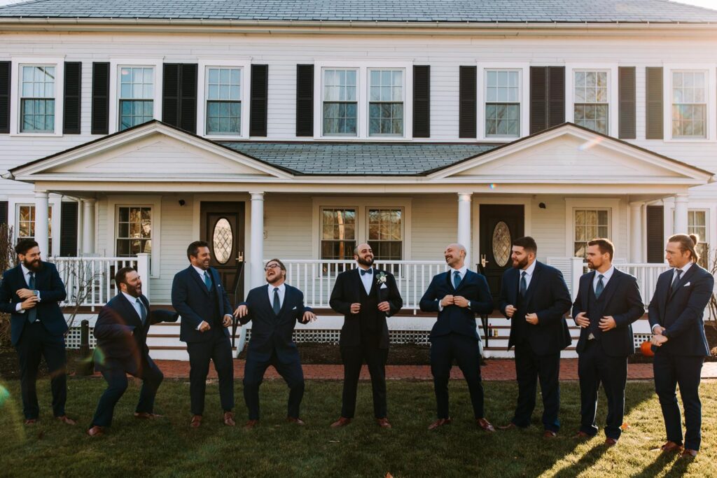 Wedding party group portrait in front of The Publick House in Sturbridge Massachusetts