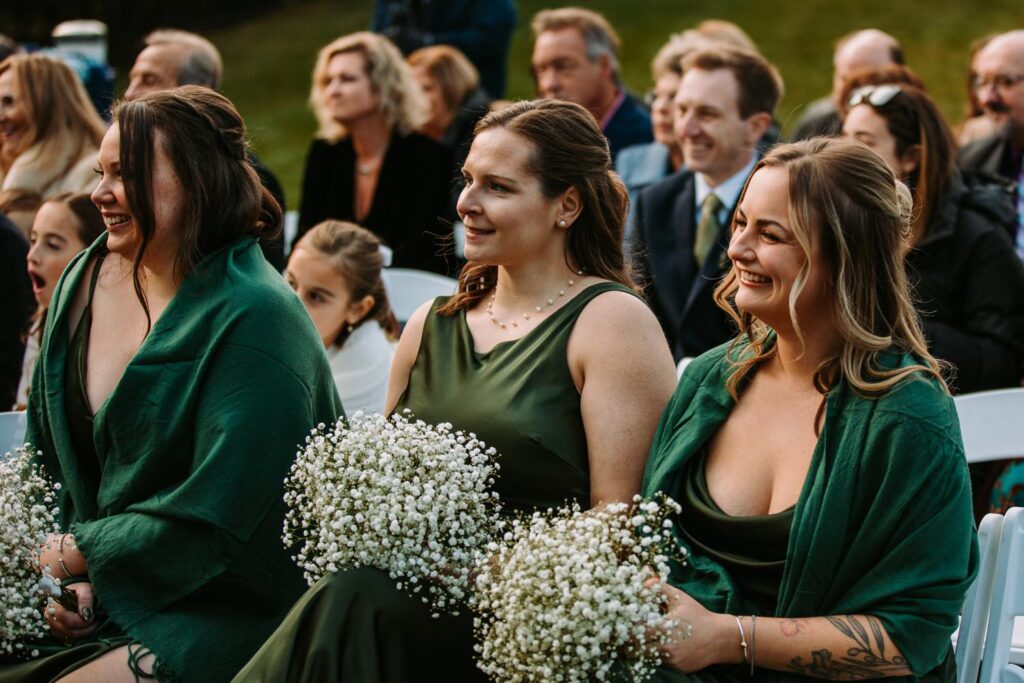 Bridesmaids watching ceremony at The Publick House wedding in Sturbridge Massachusetts