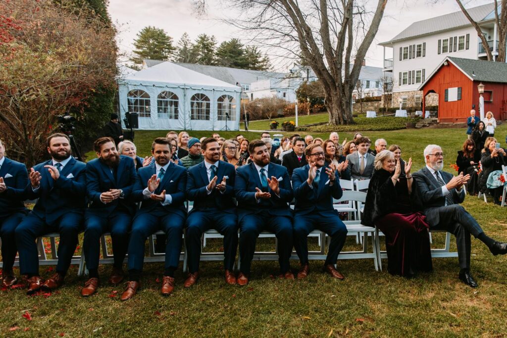 Wide shot of guests seated for outdoor ceremony at The Publick House in Sturbridge Massachusetts