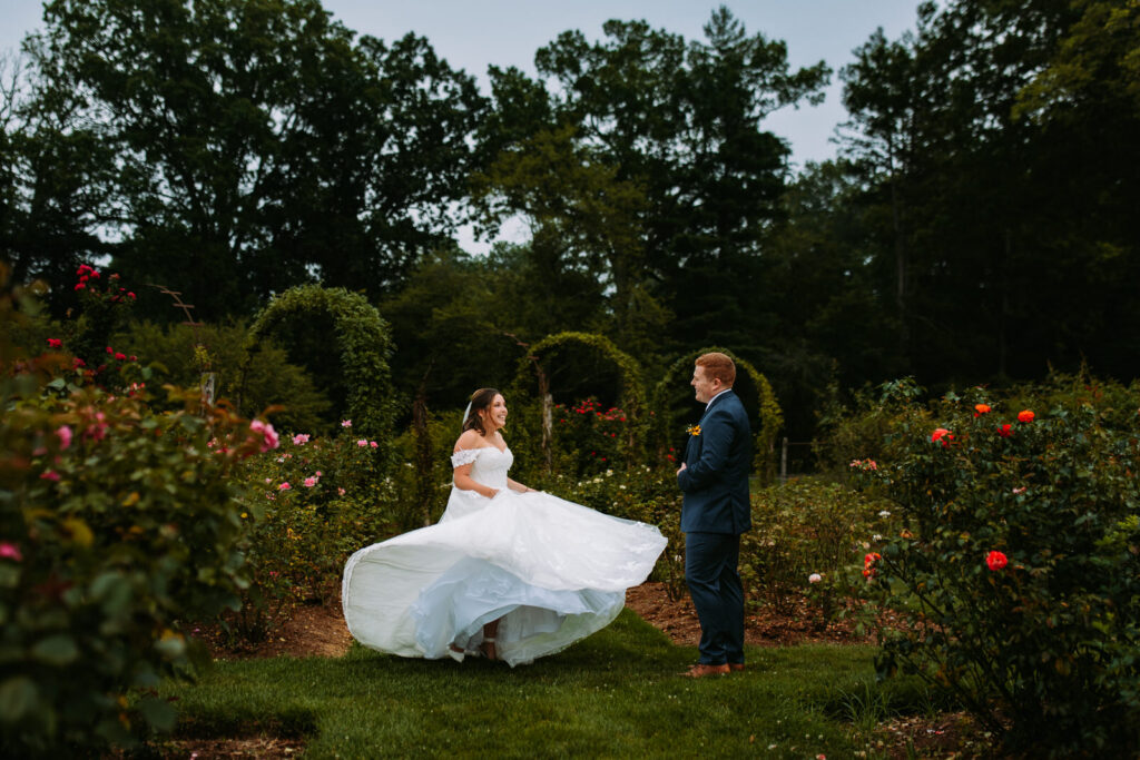 Bride twirling in the gardens at her wedding at Elizabeth Park