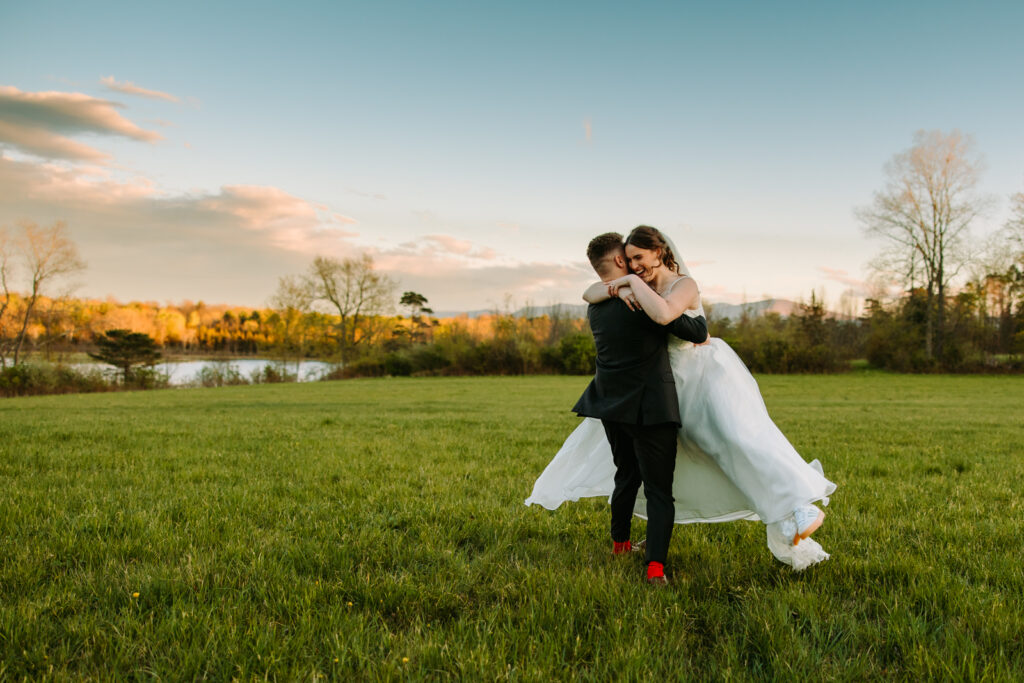 A couple spins together at their wedding at Bluebird Farm in Medusa, New York 