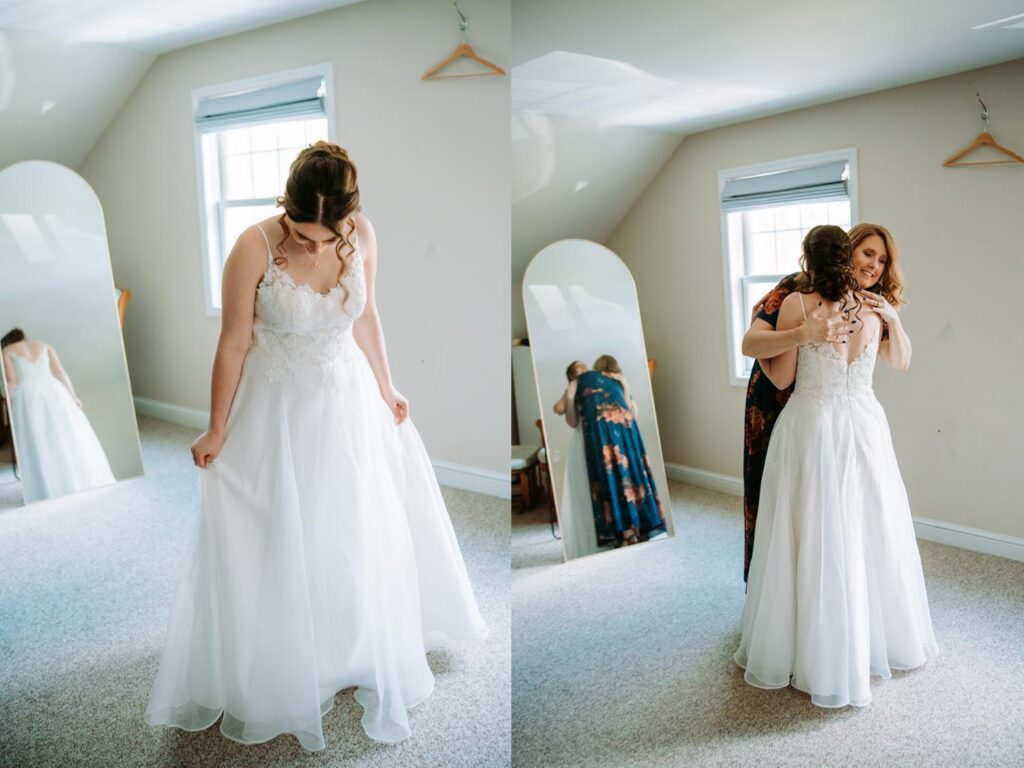 Bride alone in white wedding gown looking at herself in a mirror with an arched window, Bluebird Farm farmhouse