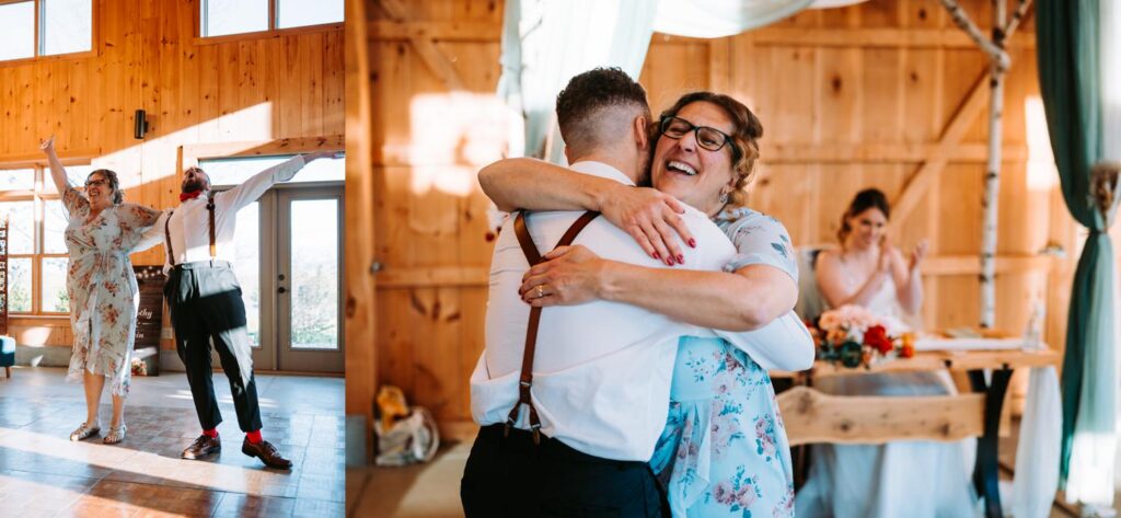 Groom sharing a warm hug with a family member during the reception, laughing, Bluebird Farm barn