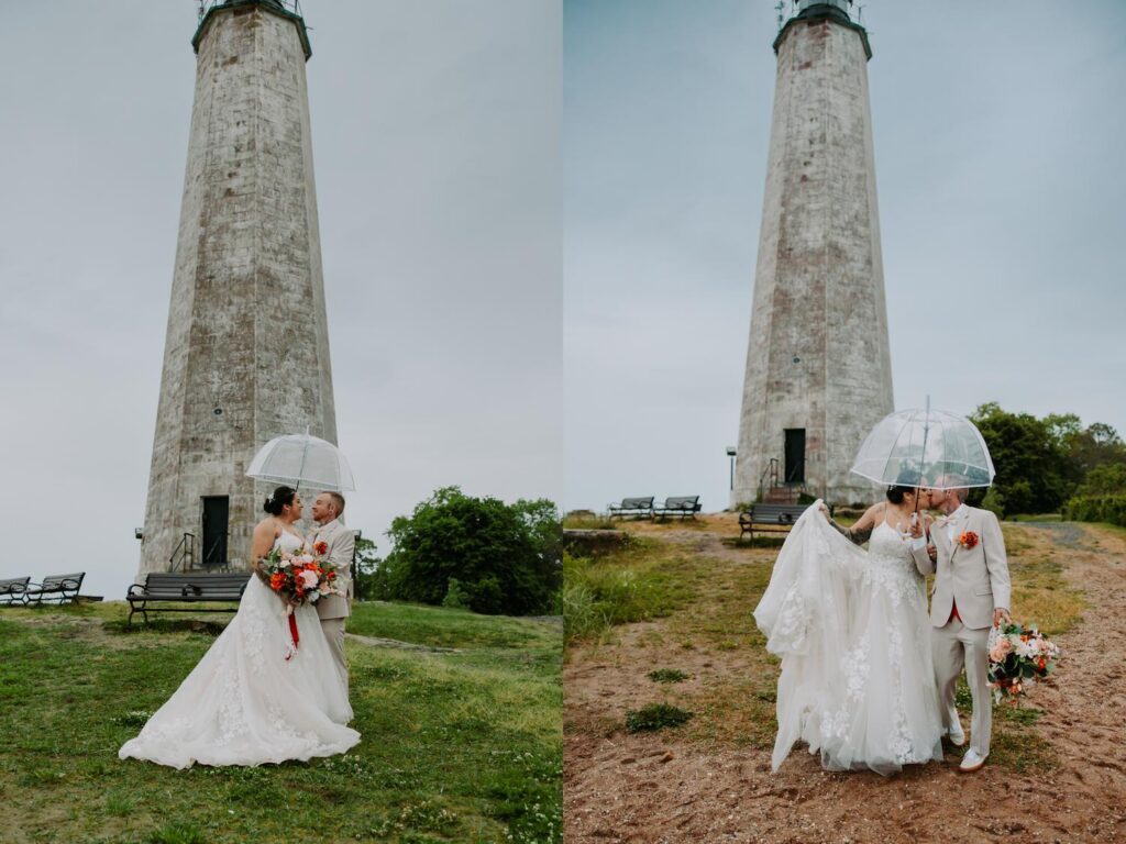 Nicole and Sabin kissing under a clear bubble umbrella at the base of the Lighthouse Point Park lighthouse, overcast sky